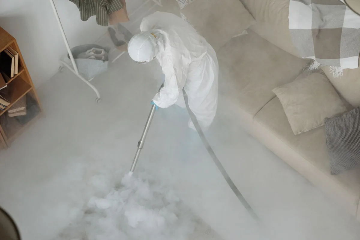 Biohazard cleanup technician in protective equipment, Rock Hill, SC
